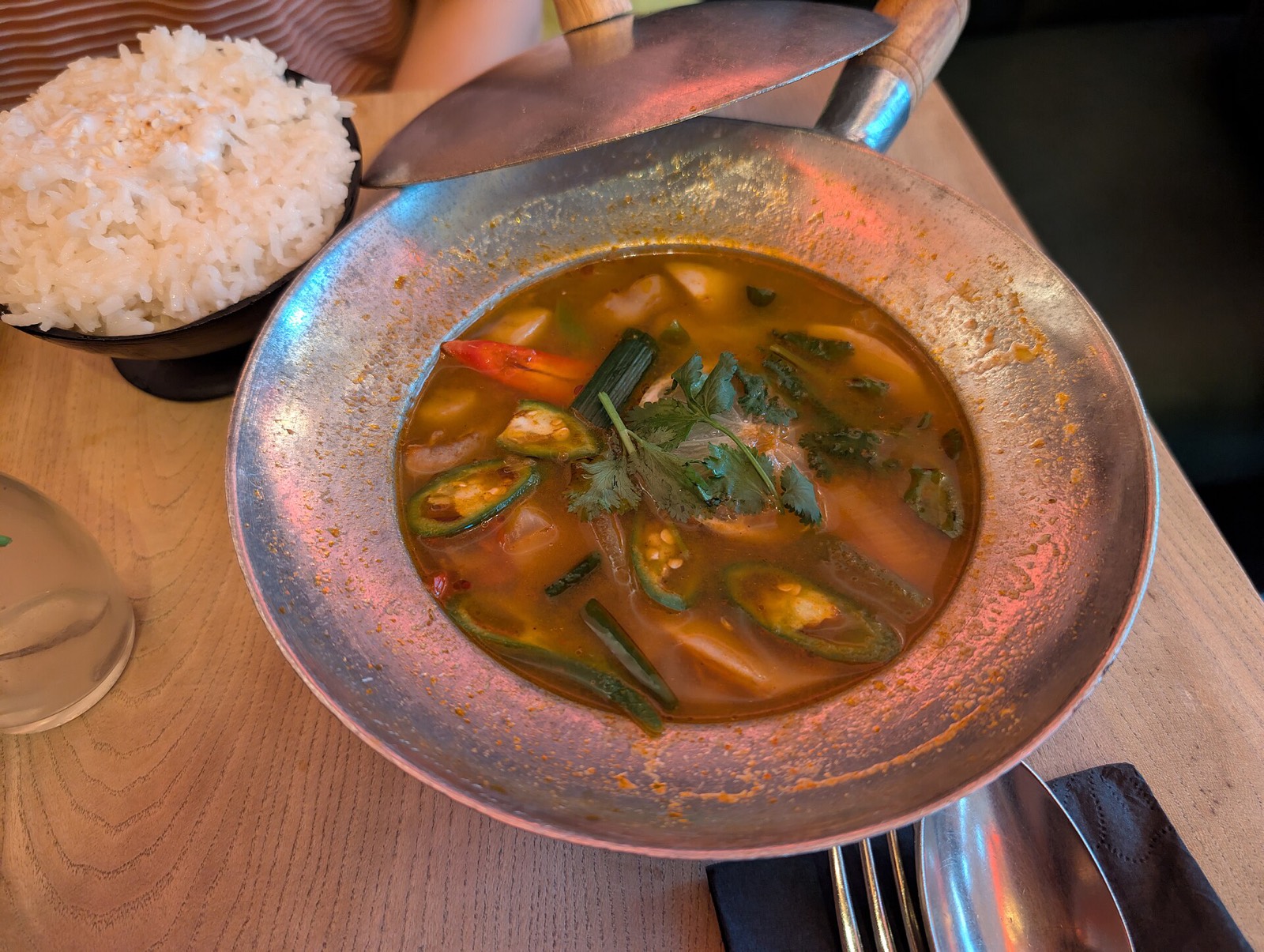 Tom yum and Thai dishes on a table